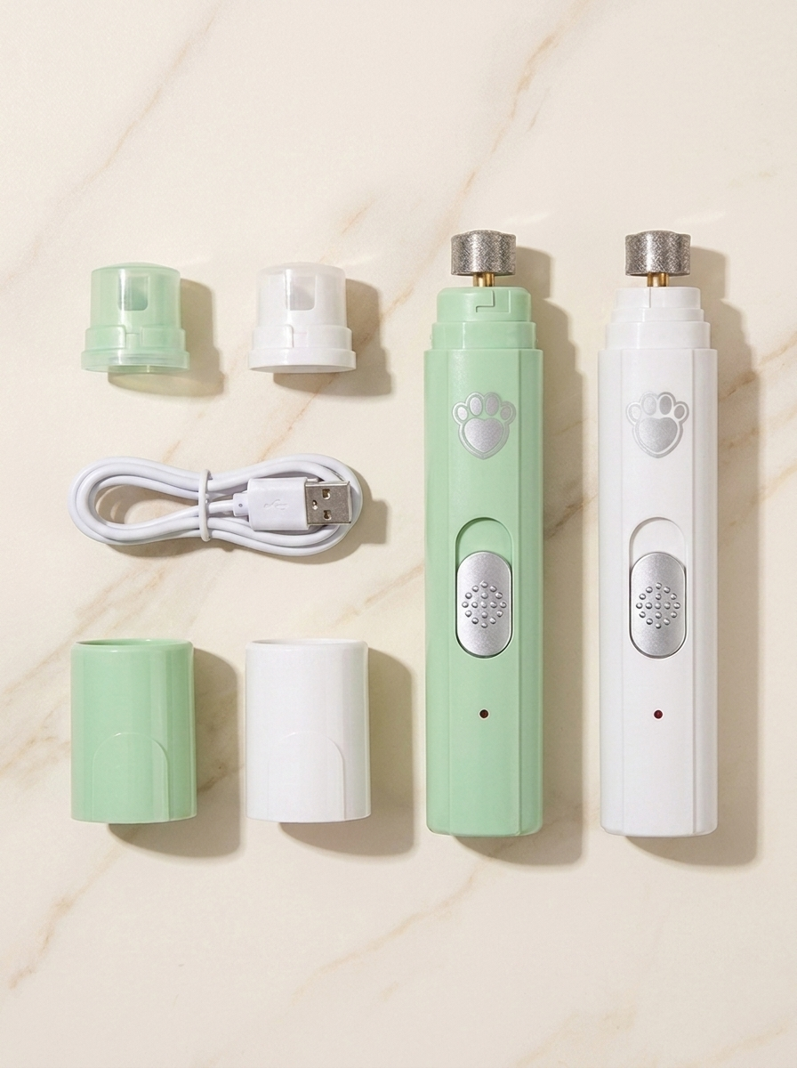 Set completo de lima de uñas eléctrica para mascotas sobre superficie de mármol